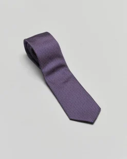 Cravatta blu e bordeaux micro fantasia di pura seta