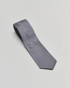 Cravatta blu fantasia trattino grigio in pura seta