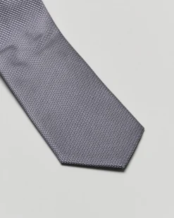Cravatta blu fantasia trattino grigio in pura seta