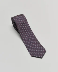 Cravatta blu in fantasia pois bianchi e bordeaux di misto seta e cotone