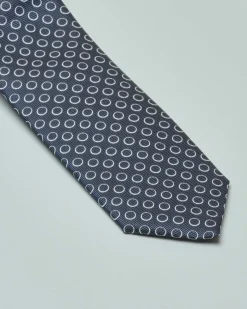 Cravatta blu in misto seta fantasia cerchietti bianchi