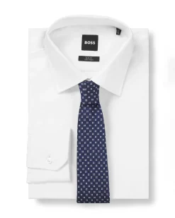 Cravatta Boss blu in misto seta con motivo a fiorellino jacquard