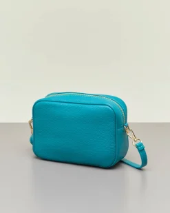 Cross bag turchese in pelle efetto martellato