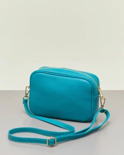 Cross bag turchese in pelle efetto martellato
