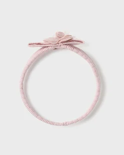 Fascetta in misto viscosa stretch rosa con fiorellino
