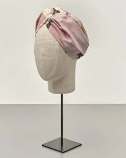 Fascia per capelli rosa a fantasia cignogne in misto modal e cupro