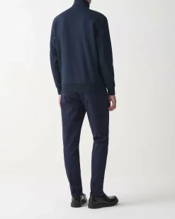 Felpa Colmar Originals blu con chiusura zip e logo bollo applicato sulla manica