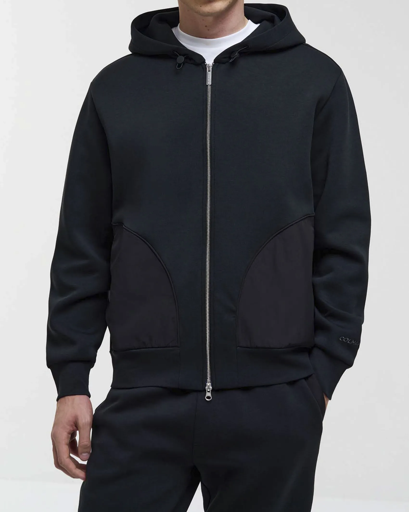Felpa Colmar Originals nera con cappuccio chiusura zip e tasche in nylon