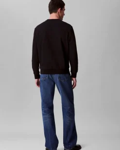 Felpa girocollo Calvin Klein Jeans nera in misto cotone con logo stampato multicolore