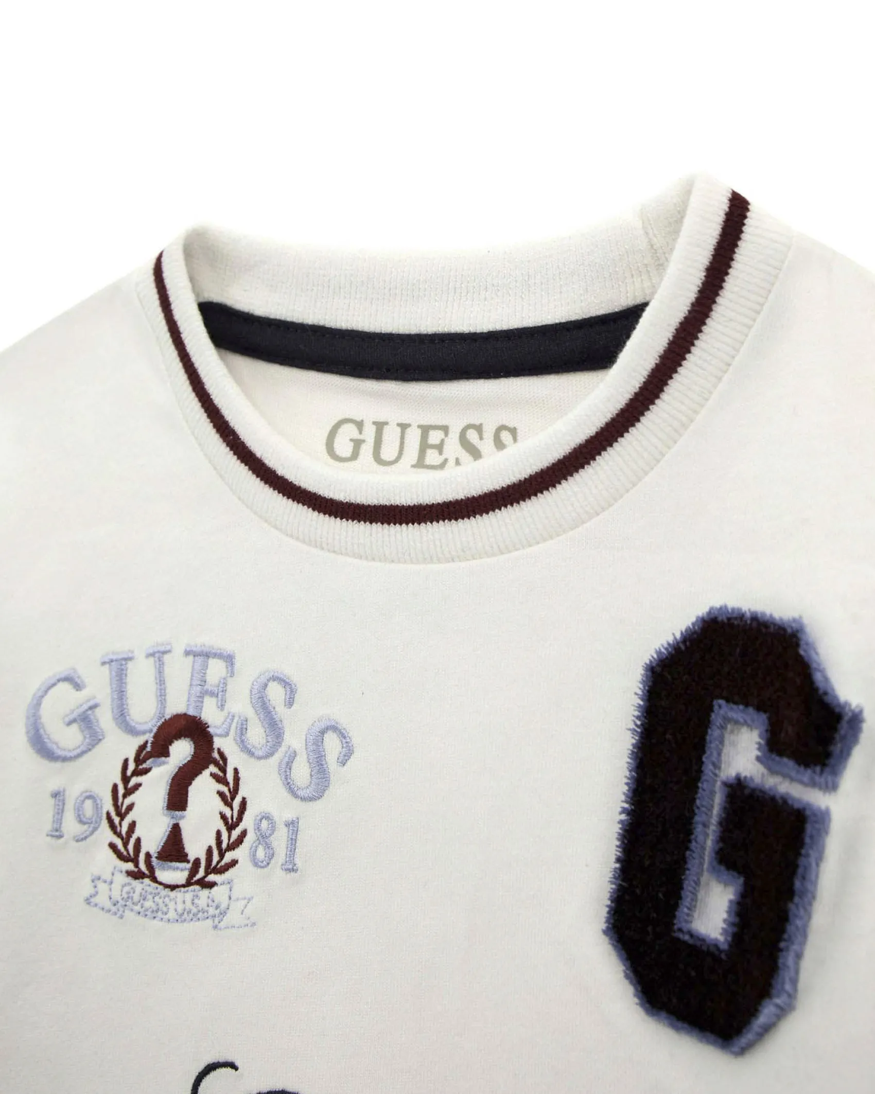 Felpa Guess bicolore color panna e blu in puro cotone con stampe e patch college