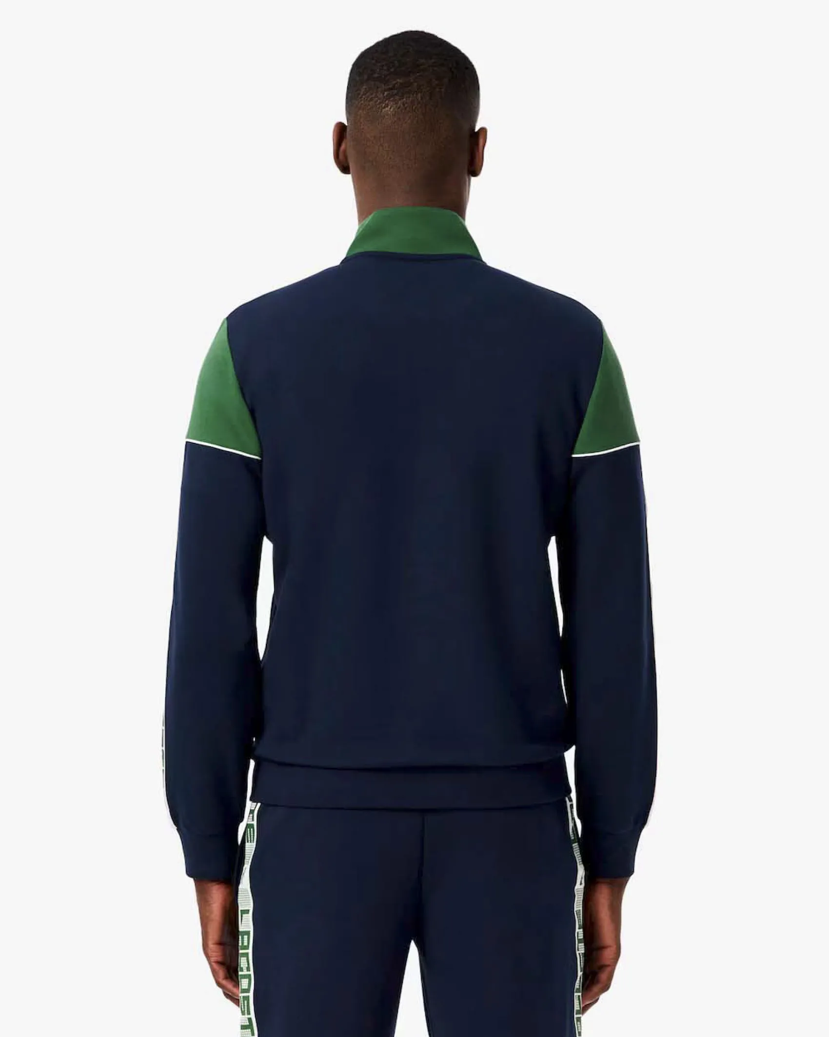 Felpa Lacoste color block verde e blu con piping porta logo e chiusura zip