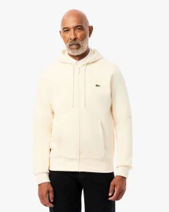 Felpa Lacoste color panna con cappuccio chiusura zip e logo coccodrillo ricamato sul petto