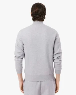Felpa Lacoste grigia con chiusura zip e logo ricamato sul petto