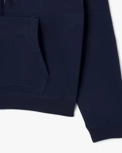 Felpa Lacoste loose-fit blu con cappuccio e tasche a marsupio
