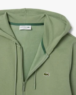 Felpa Lacoste verde salvia con cappuccio e tasche a marsupio