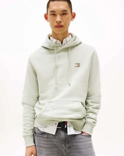 Felpa Tommy Jeans salvia con cappuccio e tasche a marsupio