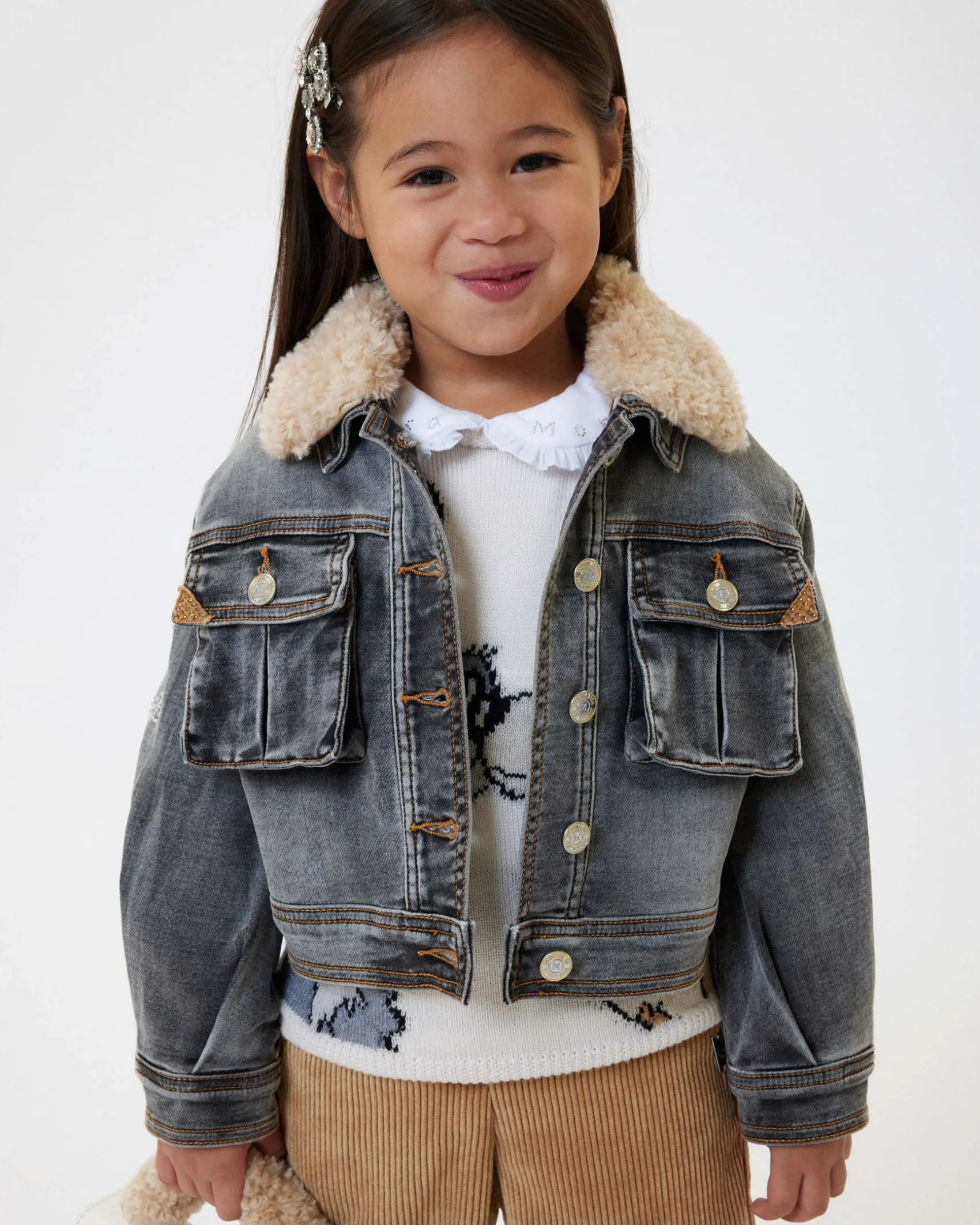Giacca Monnalisa nera in denim di cotone stretch stone washed con colletto teddy beige