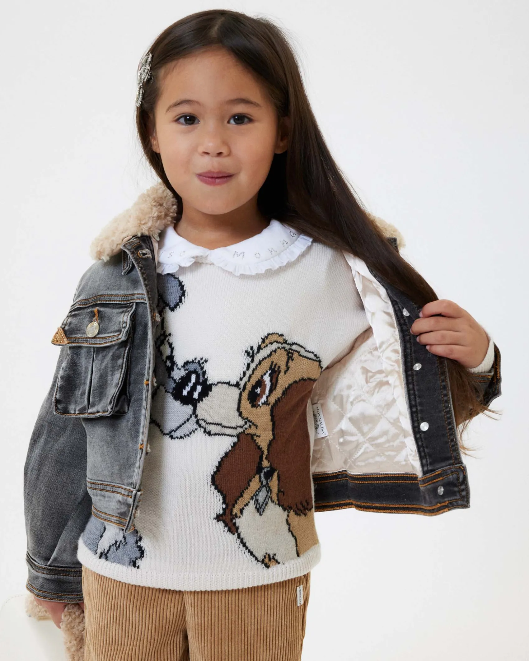 Giacca Monnalisa nera in denim di cotone stretch stone washed con colletto teddy beige