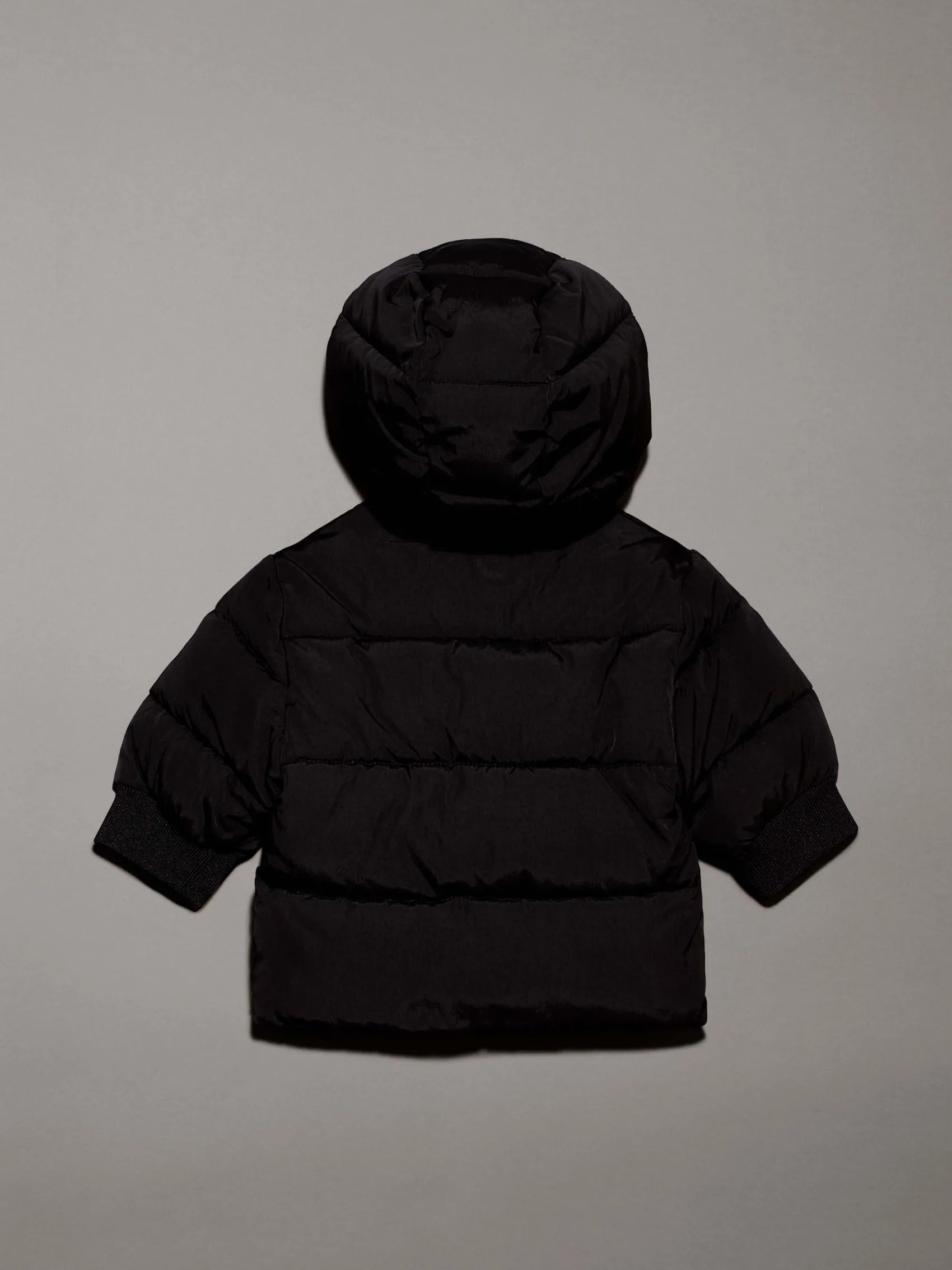 Giaccone Calvin Klein nero in nylon con cappuccio teddy bianco
