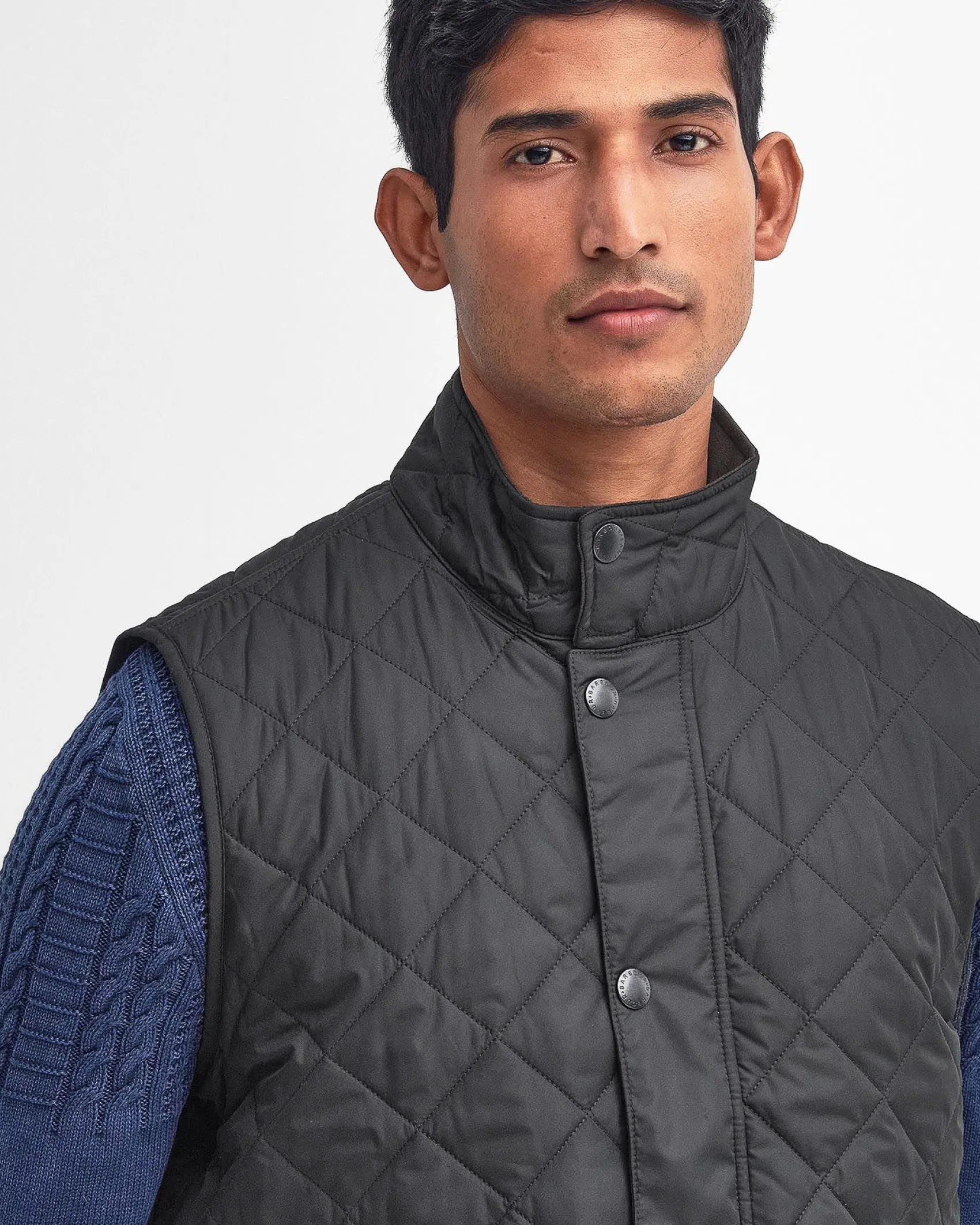 Gilet Barbour Lowerdale nero trapuntato a rombi con colletto in velluto marrone