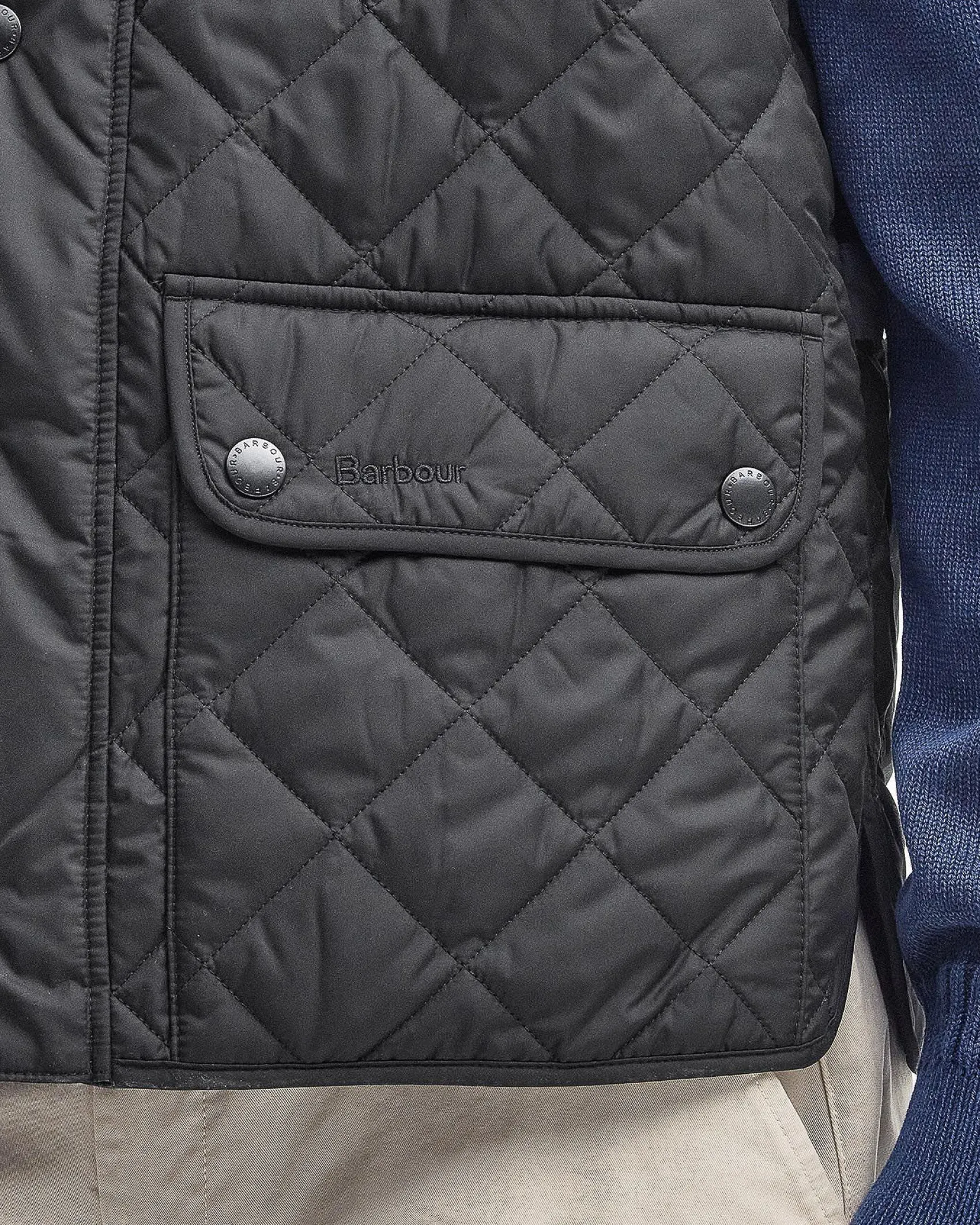 Gilet Barbour Lowerdale nero trapuntato a rombi con colletto in velluto marrone