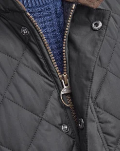 Gilet Barbour Lowerdale nero trapuntato a rombi con colletto in velluto marrone