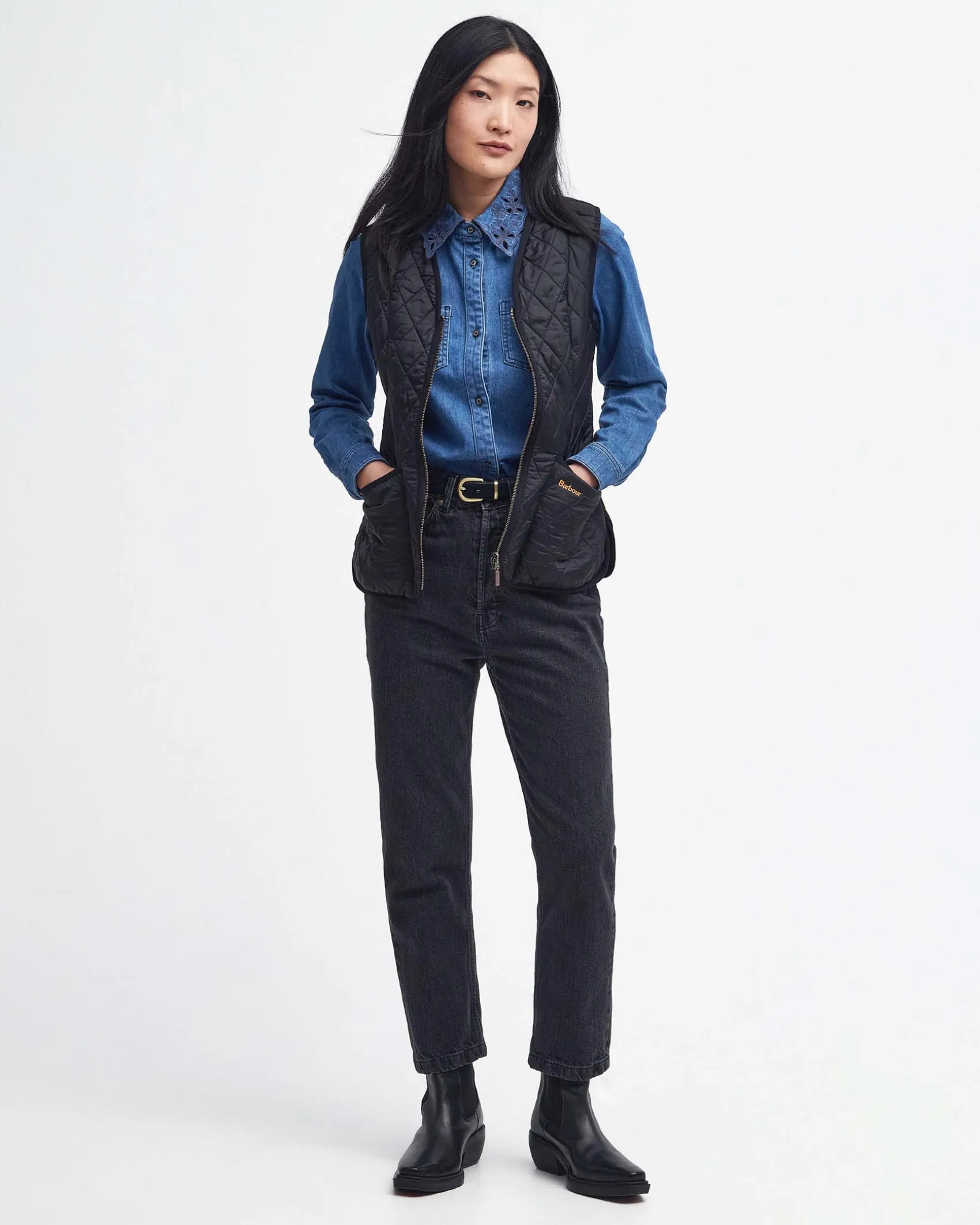 Gilet nero Barbour Flecce trapuntato dalla linea sfiancata con scollo a V e chiusura a cerniera