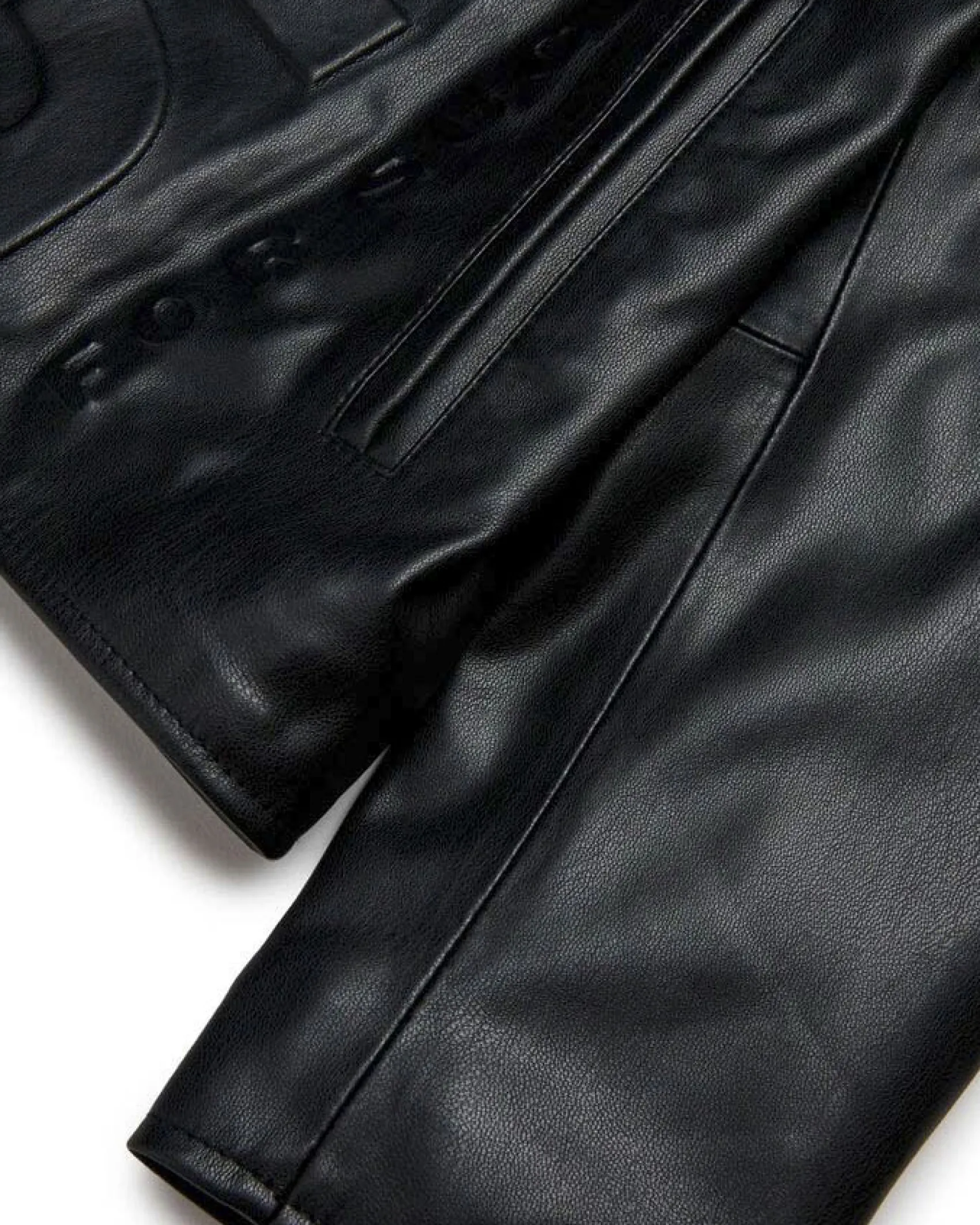 Giubbino biker Diesel in similpelle nera con maxi scritta logo in rilievo