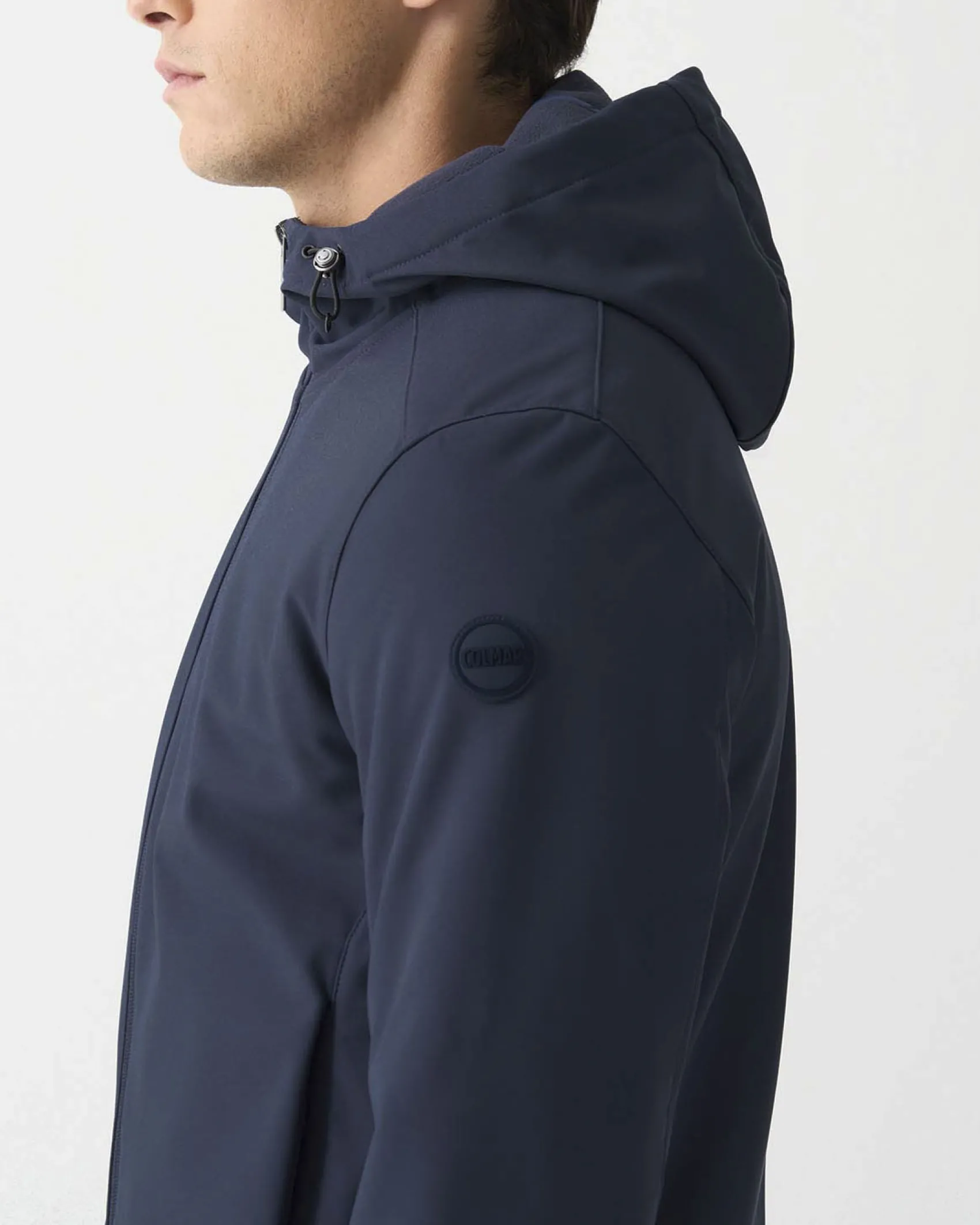 Giubbino Colmar Originals blu in softshell stretch impermeabile con cappuccio fisso