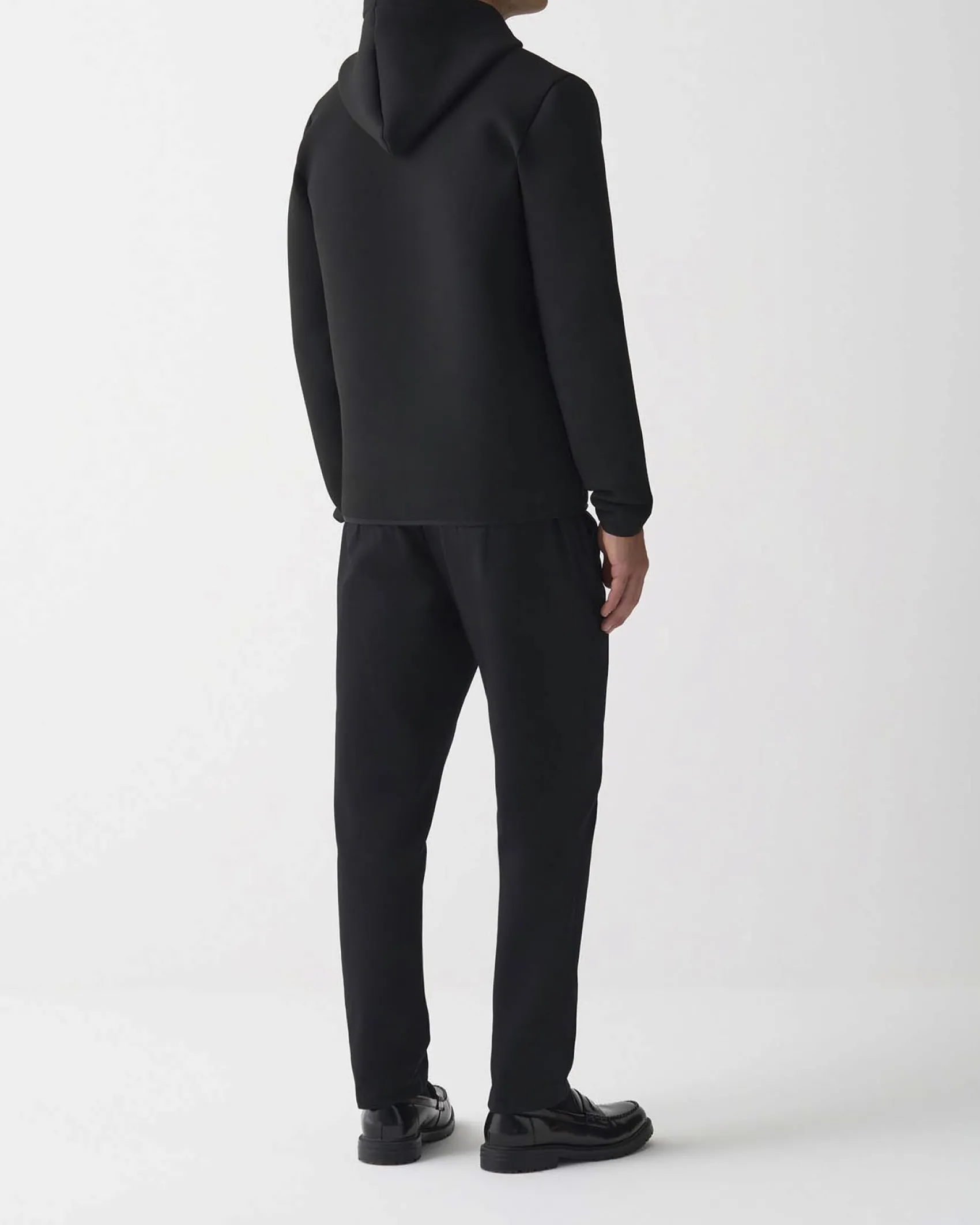 Giubbino Colmar Originals nero in tessuto stretch simil neoprene con cappuccio