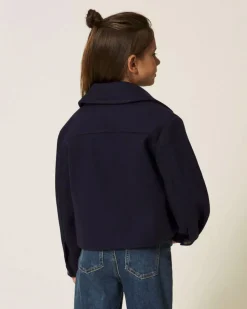 Giubbino cropped Twinset blu in panno con taschine e zip