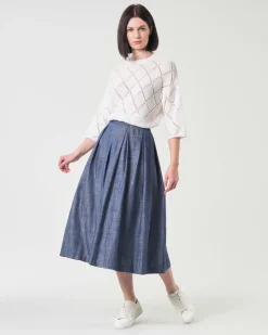 Gonna midi in denim blu fiammato in cotone dalla linea ampia con faldoni