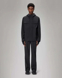 Impermeabile Rains Suva Hardshell Cargo Jacket nero in tessuto tecnico