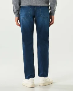 Jeans Boss Delaware slim-fit in cotone stretch lavaggio medio con leggere baffature