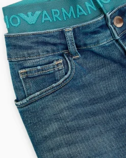 Jeans Emporio Armani a lavaggio medio stone washed in cotone stretch con fascia elastica logata ottanio