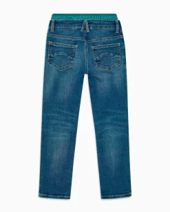 Jeans Emporio Armani a lavaggio medio stone washed in cotone stretch con fascia elastica logata ottanio