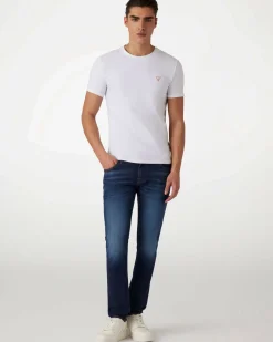 Jeans skinny Guess blu in cotone elasticizzato lavaggio scuro con baffature