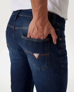 Jeans skinny Guess blu in cotone elasticizzato lavaggio scuro con baffature