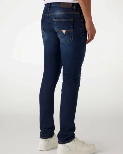 Jeans skinny Guess blu in cotone elasticizzato lavaggio scuro con baffature