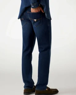 Jeans slim Guess blu in cotone elasticizzato lavaggio scuro stone washed