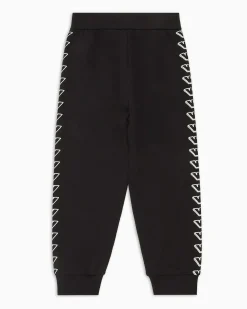 Jogger Emporio Armani in felpa di cotone nera con stampa grafica aquile bianche