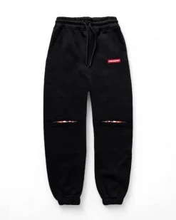 Jogger in felpa di cotone neri con coulisse e strappi
