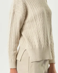 Maglia beige Hlo! in misto viscosa a trecce con spacchetti laterali al fondo