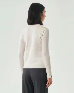 Maglia bianca Hlo! in misto viscosa con polsini alti lavorati a costine con bottoncini in metallo satinato