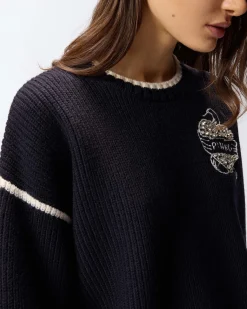 Maglia blu a coste Pinko in lana merino dalla linea cropped con cuore e logo ricamato sul petto