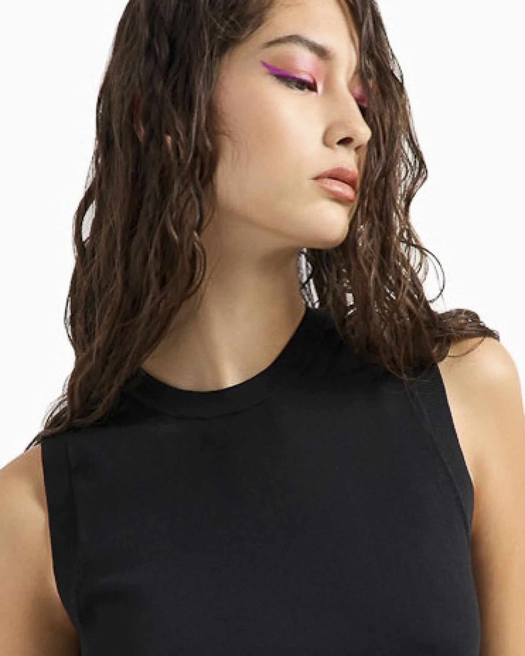 Maglia color latte in misto viscosa stretch senza maniche