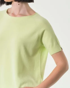 Maglia color lime in misto viscosa a maniche corte con spacchetto sul fondo posteriore