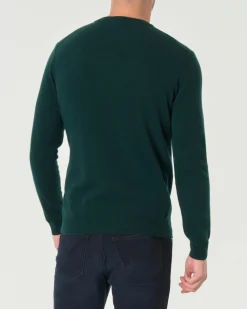 Maglia girocollo Woolrich verde scuro in lambswool di pura lana con logo ricamato sul polso