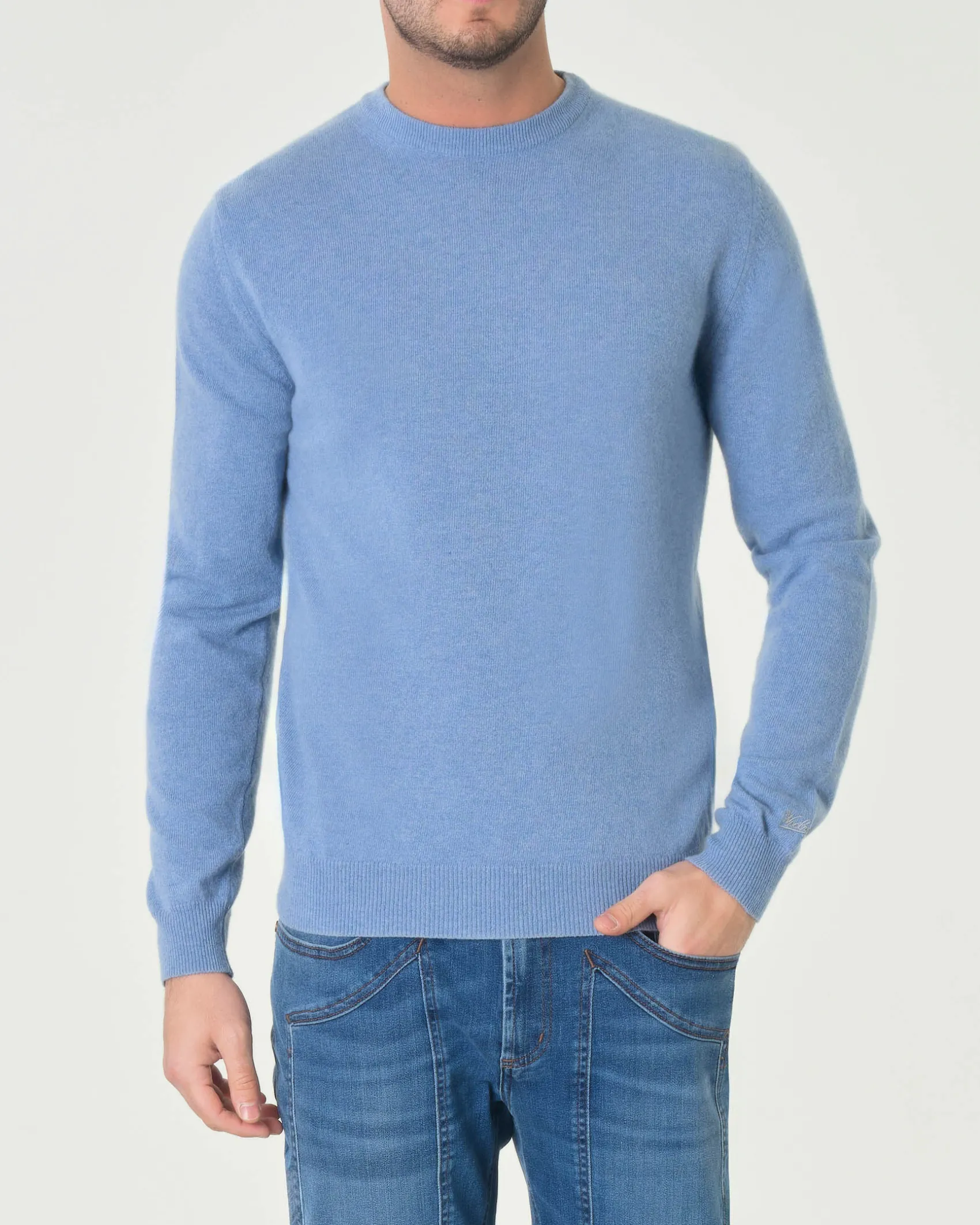 Maglia girocollo Woolrich azzurra in lambswool di pura lana con logo ricamato sul polso