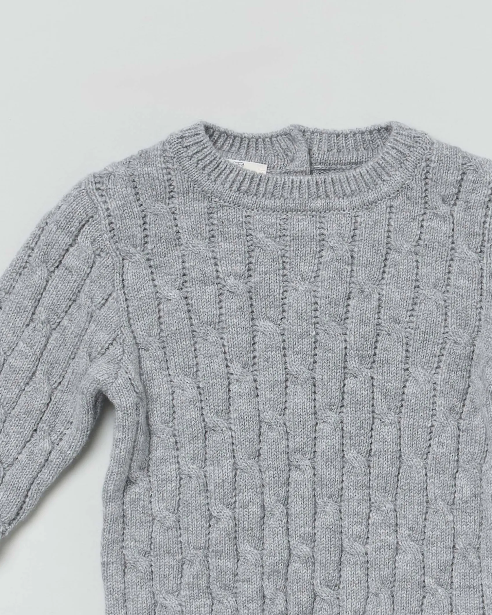 Maglia grigio girocollo in pura lana a trecce
